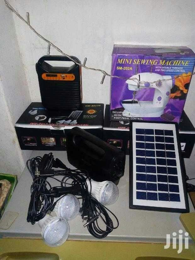solar kit with radio,usb port,3 bulbs, torch,phone charging